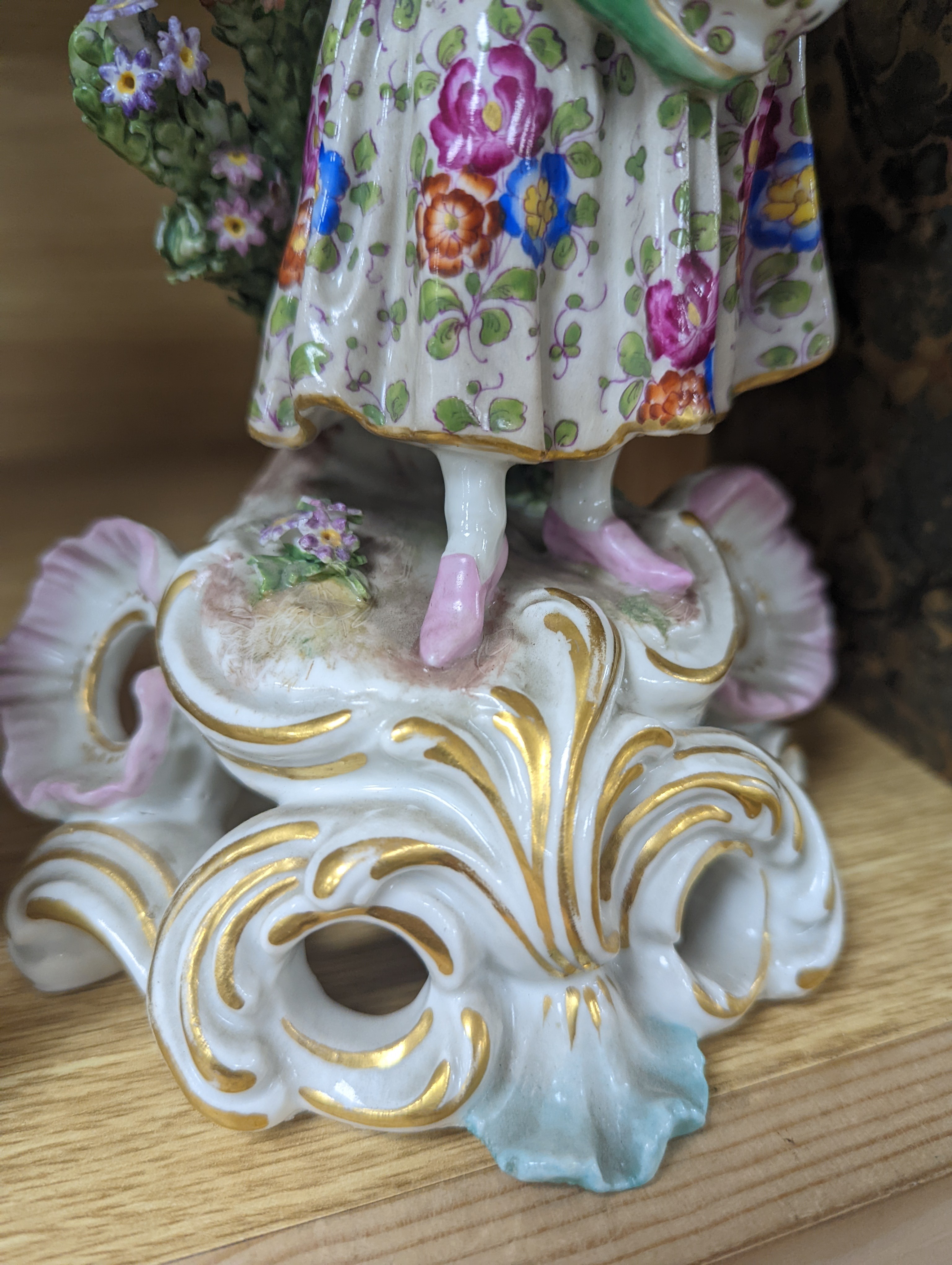 Two Continental porcelain figures, a lady and a gent 27cm